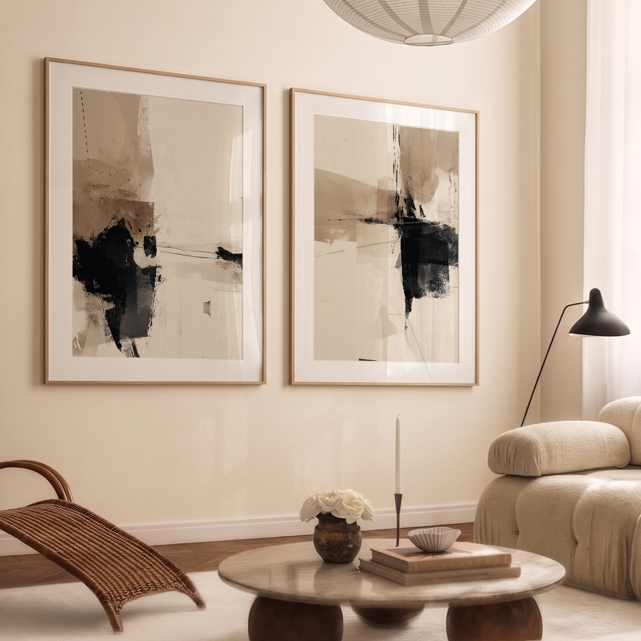 Neutral Abstract Wall Art Set of 2 | Black & Beige Prints displayed above a neutral living room sofa, featuring expressive black and beige abstract art prints.