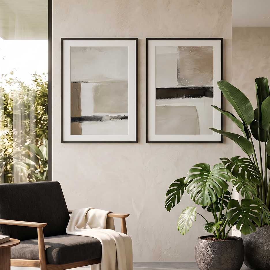 Minimalist Japandi Wall Art Set | Beige & Black Abstracts featuring two neutral abstract art prints in black frames above a modern chair and leafy plants