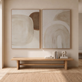 Wabi-Sabi Neutral Wall Art Set of 2 | Abstract Canvas with two minimalist beige abstract paintings displayed above a wooden bench in a living room