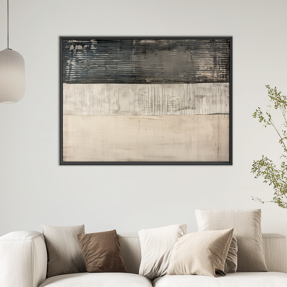 Neutral Abstract Wall Art | Minimalist Triptych Canvas displayed above a cream sofa with layered beige and charcoal textures in a serene living room setting