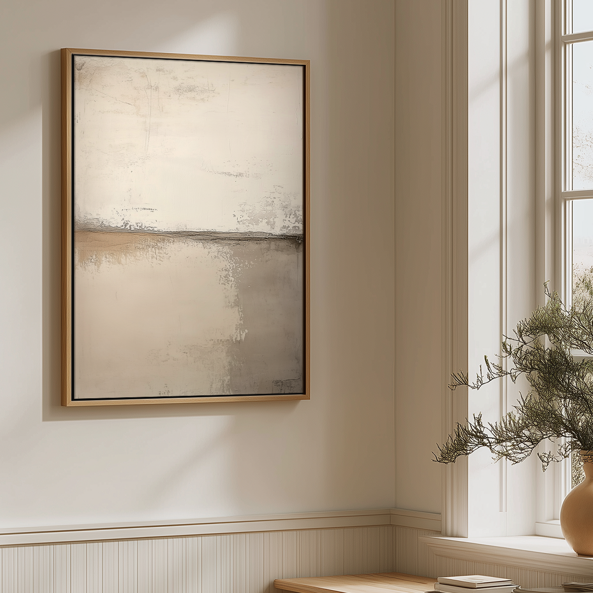 Neutral Abstract Wall Art Print - Scandinavian Modern Beige Canvas Wall Decor hanging in a light-filled room beside a window with natural wood frame and minimalist decor.