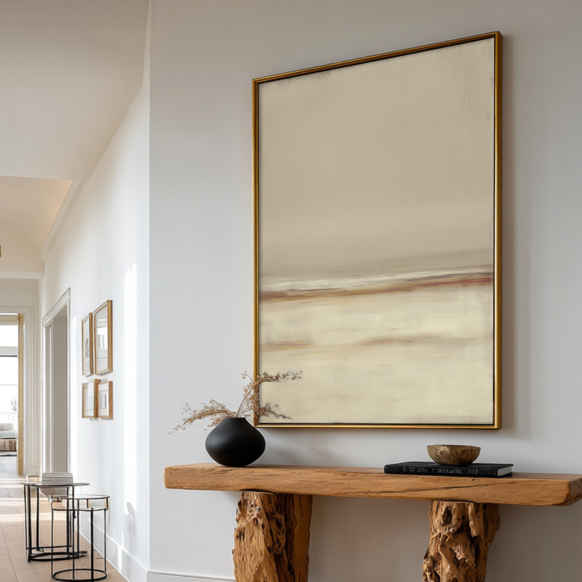 Neutral Seascape Wall Art | Beige Abstract Canvas hanging above a rustic wooden console table in a minimalist hallway, featuring soft beige and cream tones for modern wall art decor.