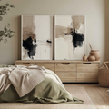 Neutral abstract wall art set featuring expressive black brushstrokes on warm beige and cream backgrounds in a modern minimalist style.