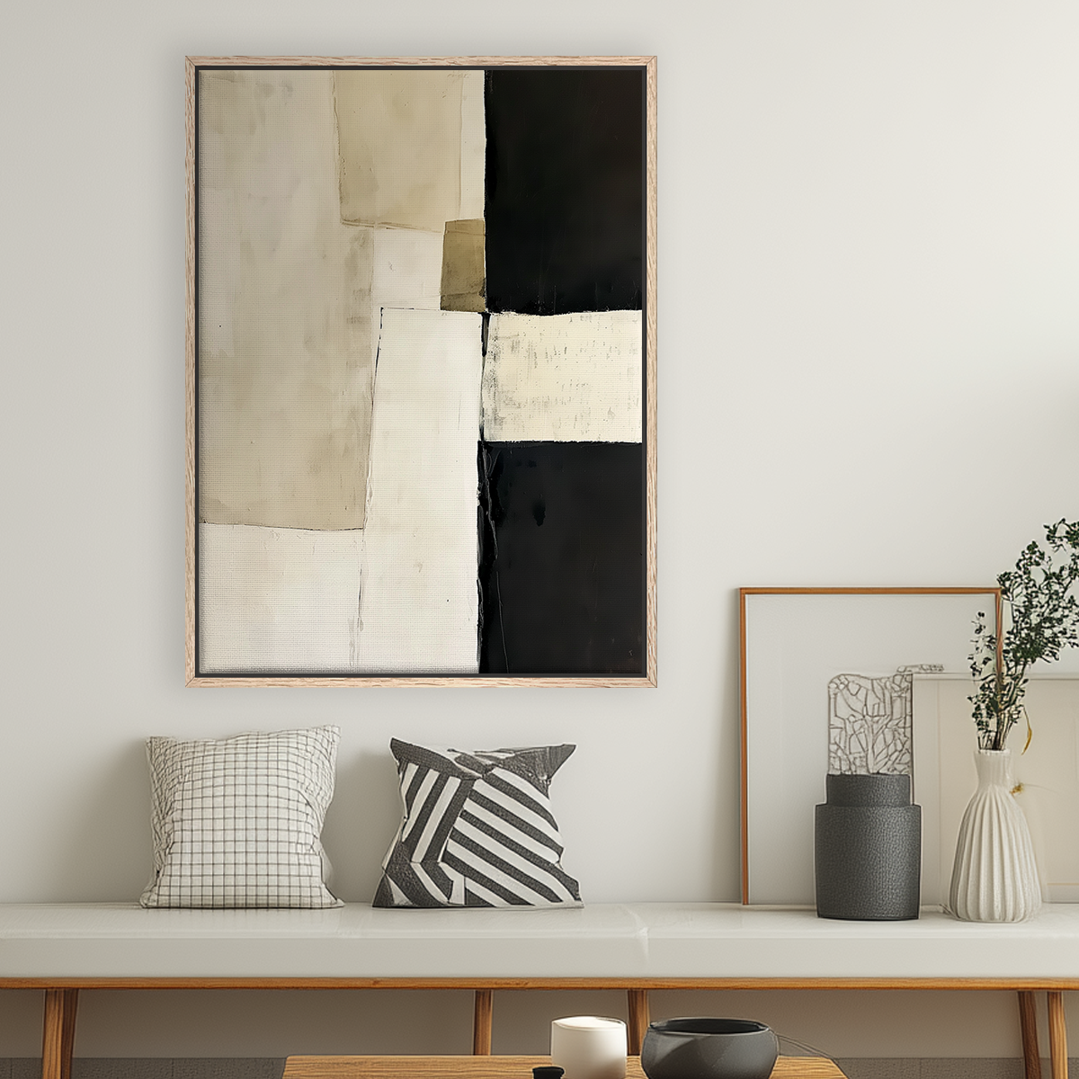 Architectural Abstract Wall Art | Modern Neutral Geometric Canvas | Textured Minimalist Decor featuring a framed abstract composition in shades of beige, black, and white above a bench with patterned pillows and neutral decor accents.