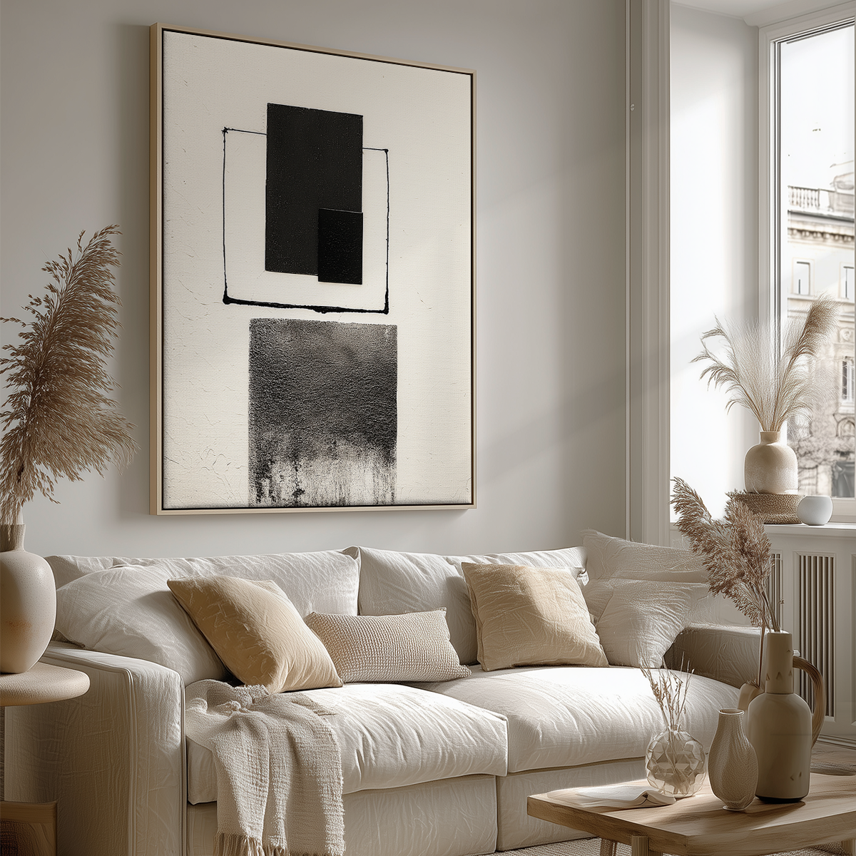 Abstract Geometric Wall Art Print – Modern Minimalist Black & White Textured Decor hanging above a neutral-toned sofa in a bright living room with natural light and soft beige accents.