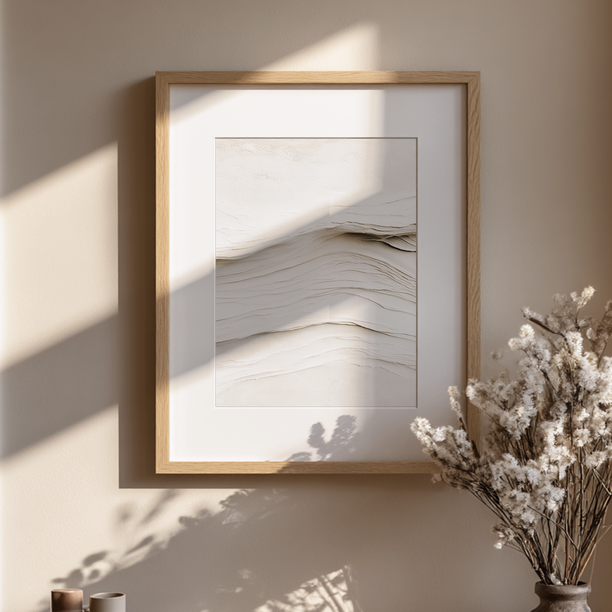 Beige Abstract Wall Art | Neutral Textured Minimalist Print in a natural wood frame, featuring layered flowing lines and soft neutral tones beside dried flowers