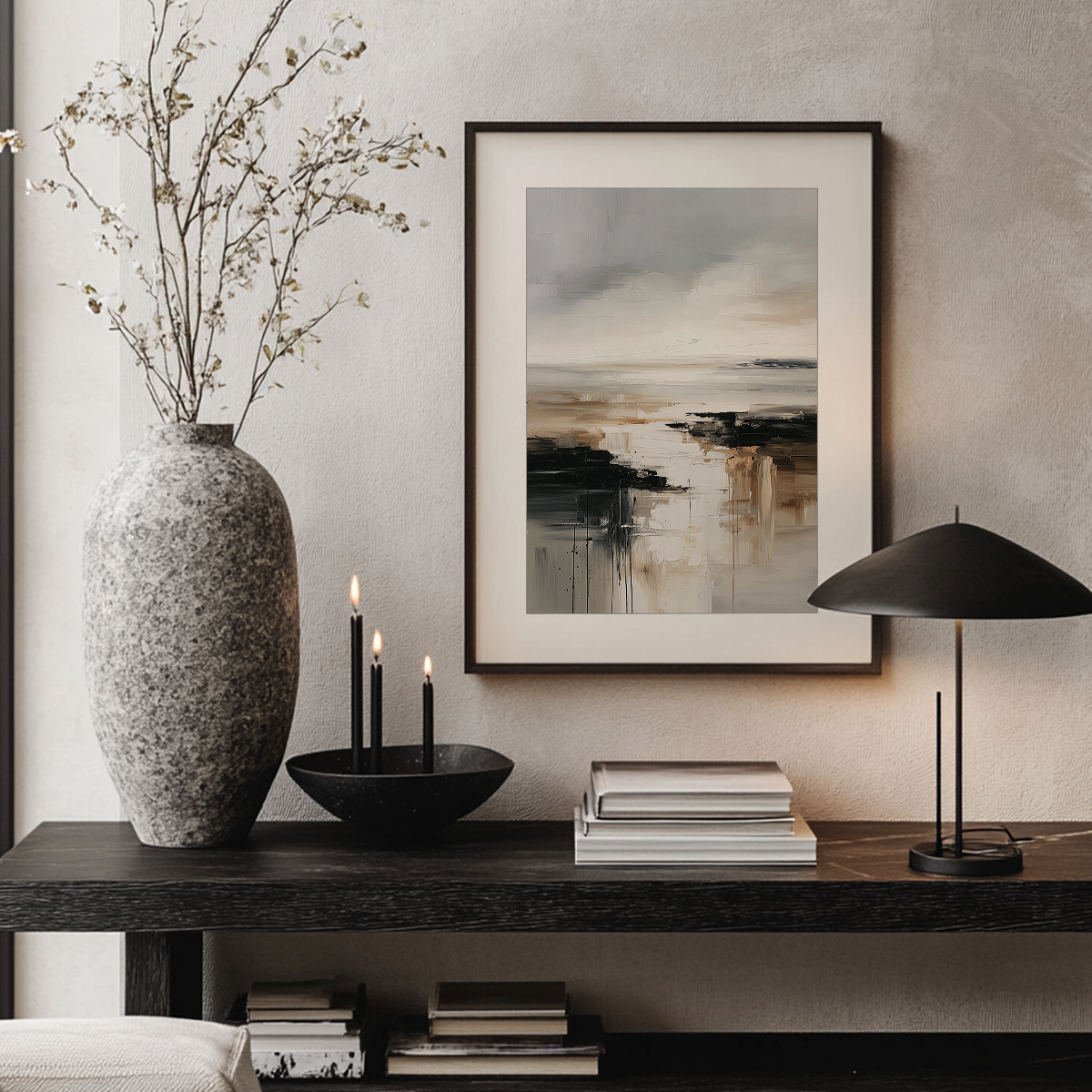 Neutral abstract landscape canvas print framed above a console table styled with candles