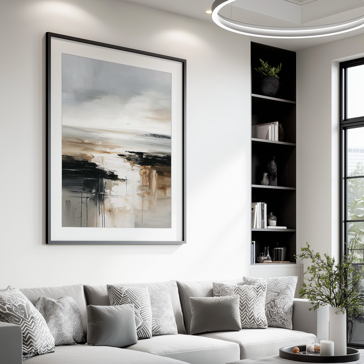 Angled view of a neutral abstract landscape canvas print hanging above a couch