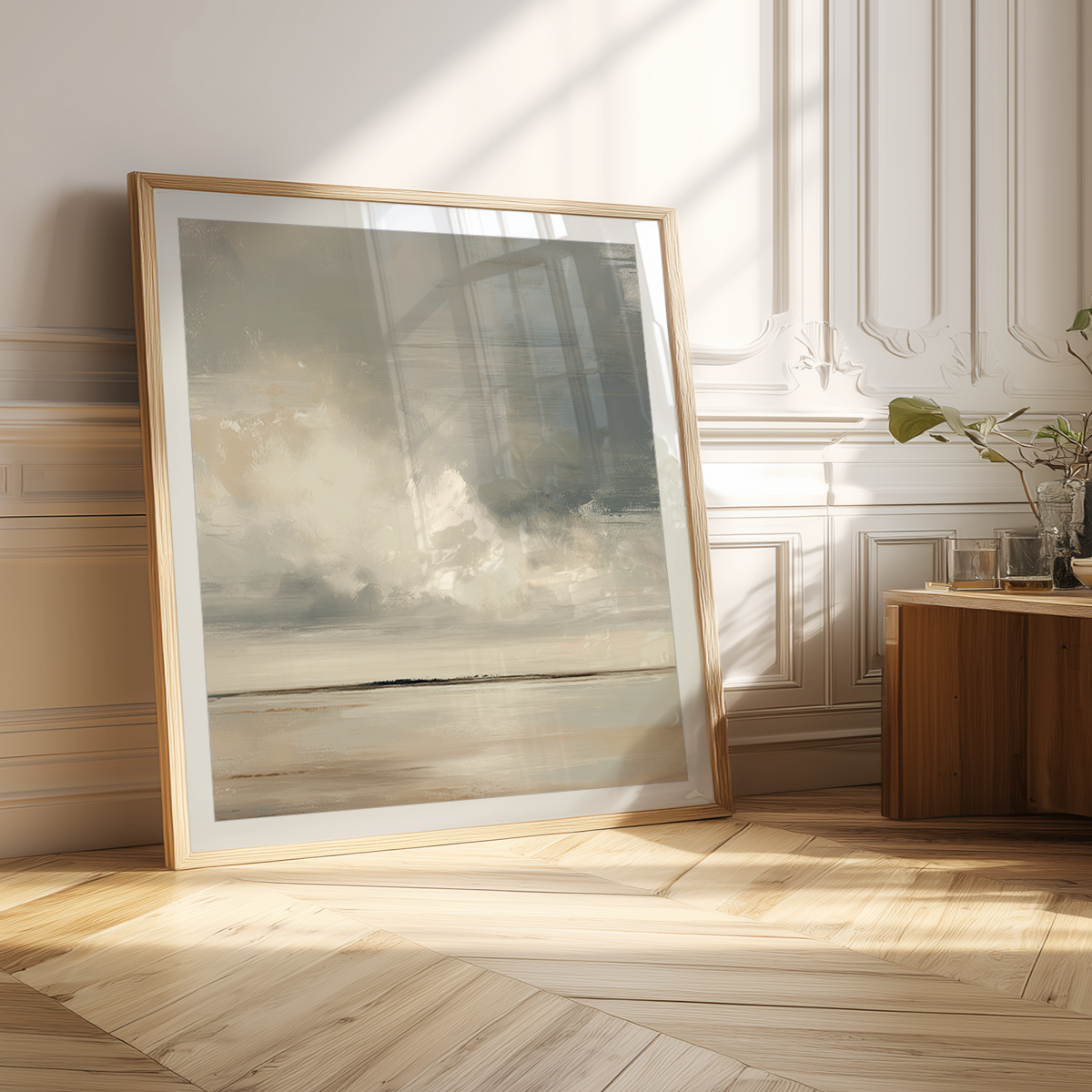 Framed Neutral Serene Horizon Abstract Canvas Print - Modern Minimalist Decor leaning against a light wall in a sunlit room with wooden floors and simple furnishings.