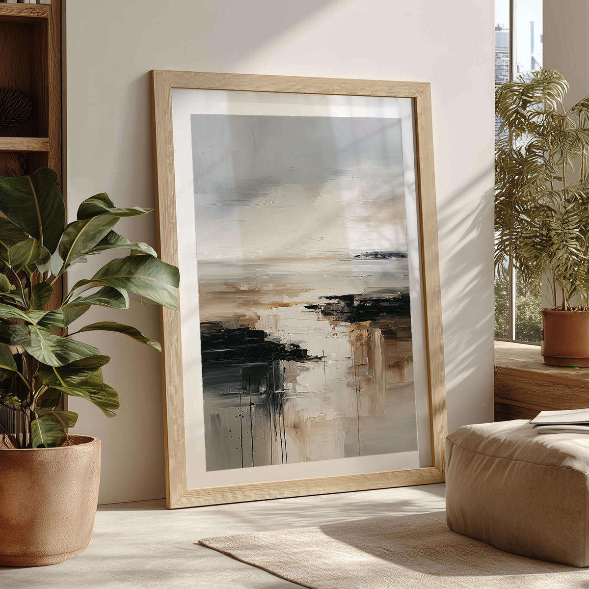 Neutral abstract landscape canvas print resting against a wall showing its natural wood frame
