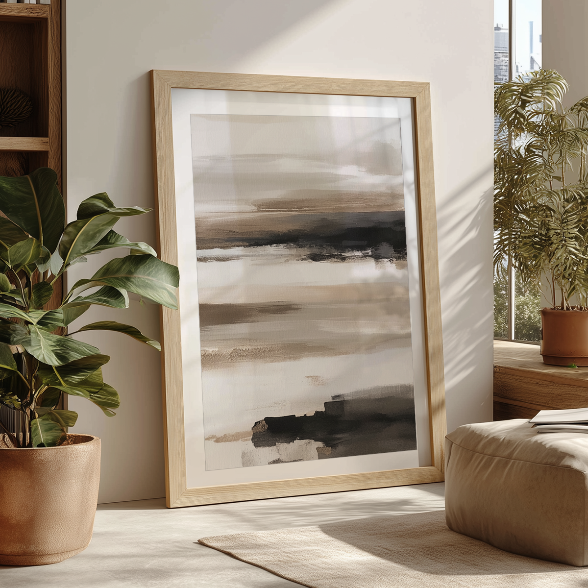 Abstract Horizon Wall Art | Neutral Watercolor Landscape leaning against a wall in a sunlit room, featuring soft beige and gray tones with a wooden frame, surrounded by neutral modern decor.