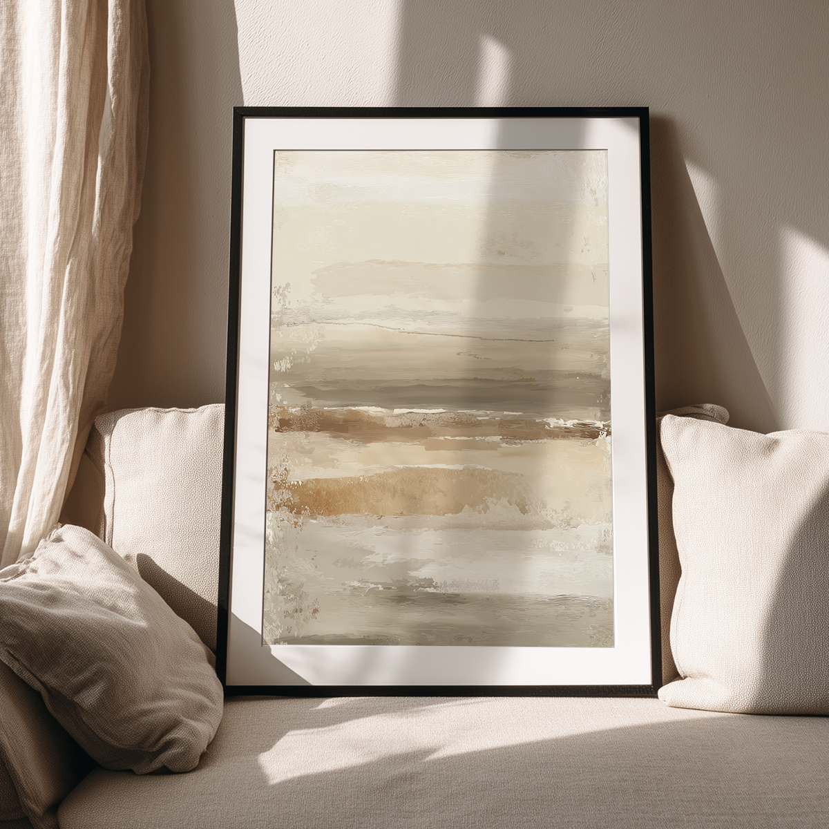 Neutral Abstract Wall Art Canvas | Beige Taupe Textured Horizon Art | Japandi Modern Decor framed and resting on a beige couch with soft pillows in a minimalist living room setting.