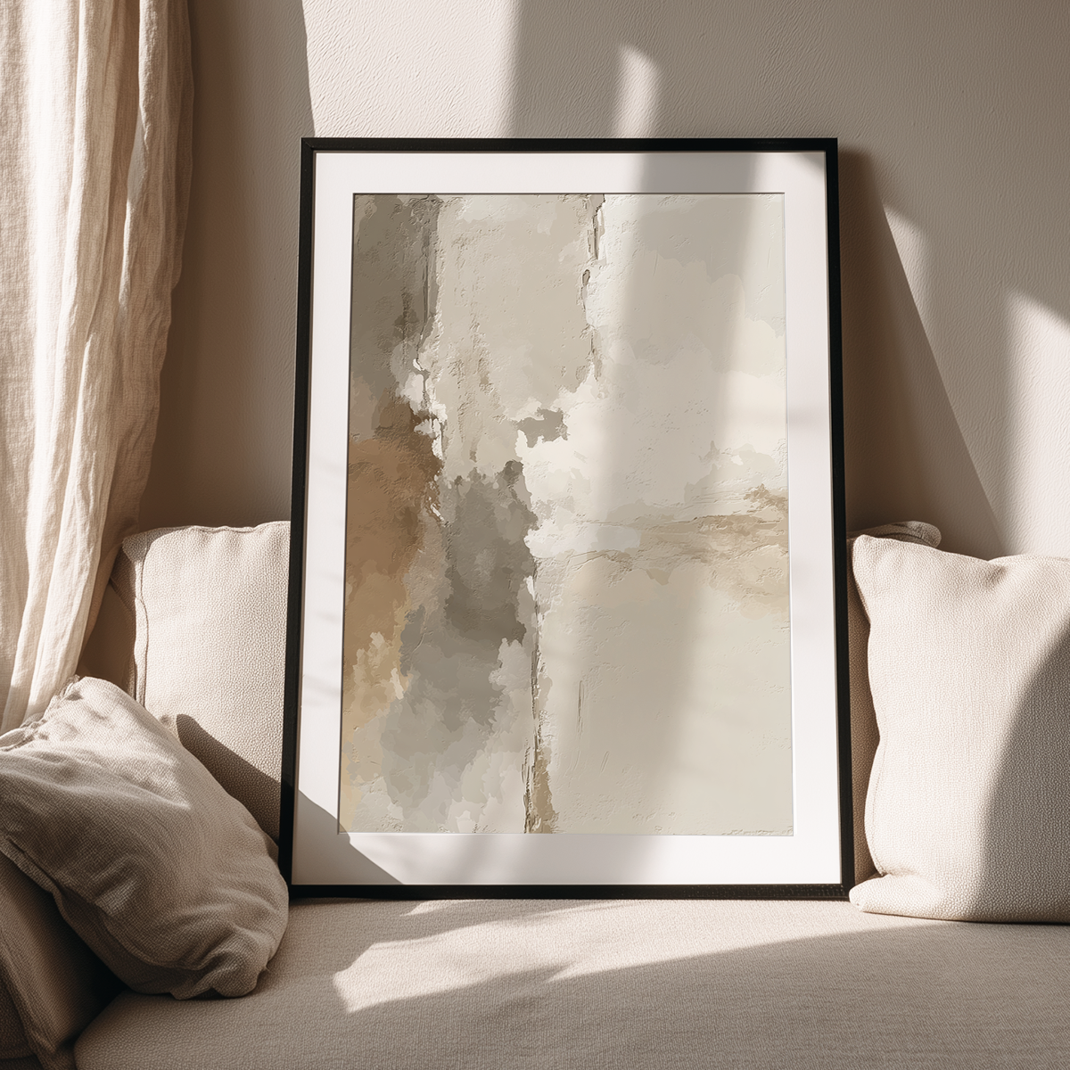 Japandi Abstract Wall Art | Neutral Textured Plaster Canvas framed modern minimalist abstract art print in soft beige and gray tones displayed on a cozy cream sofa with neutral pillows.
