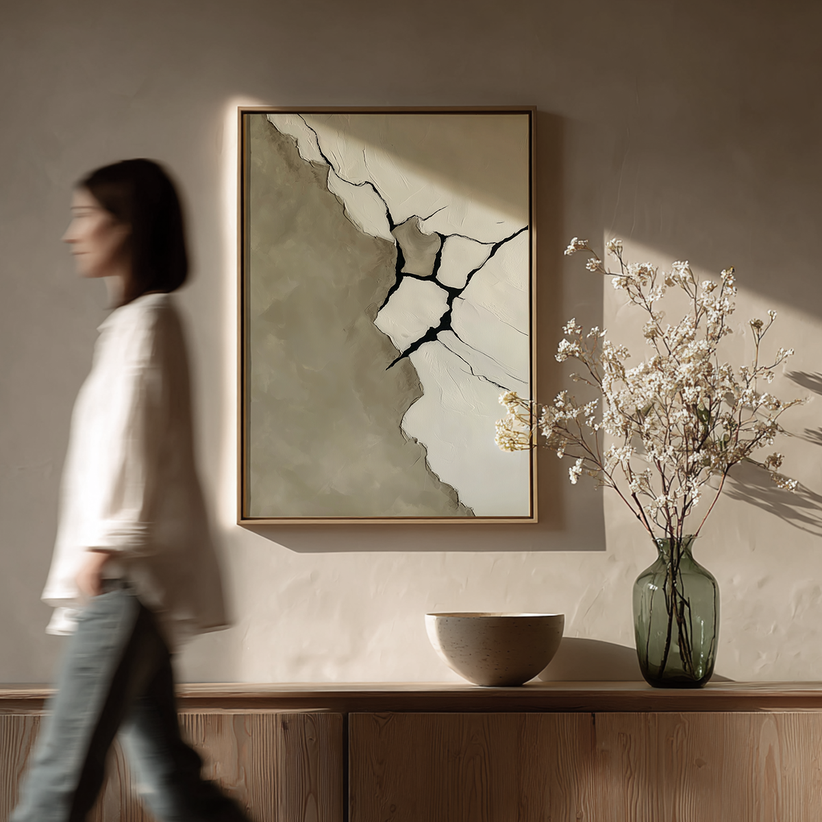 Fractured Silence | Minimalist Abstract Art Print | Canvas & Poster Print featuring neutral tones and cracked abstract design, displayed in a modern living room with natural light and simple decor.